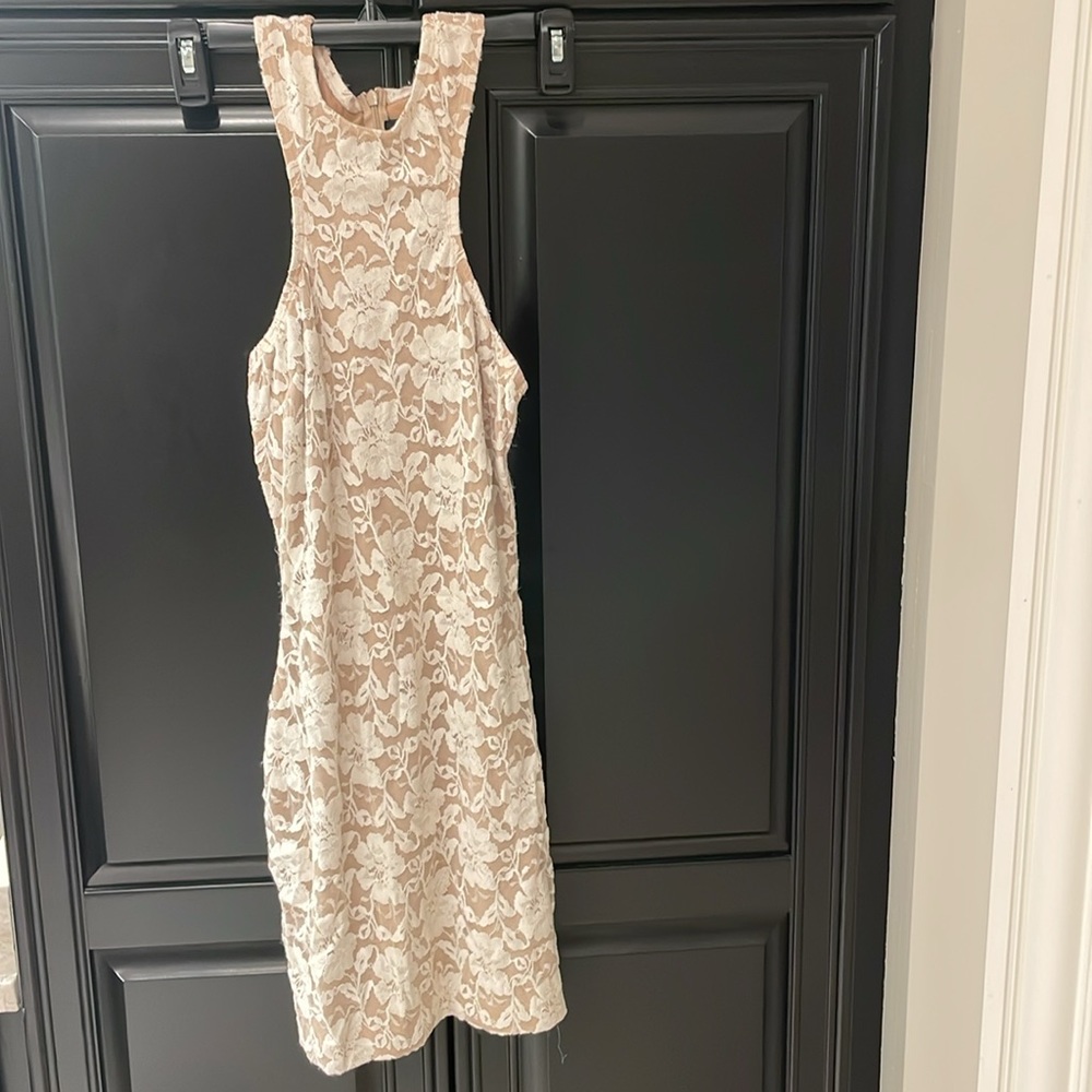 FLORAL MINI DRESS! NUDE COLOR AND WHITE FLORAL! Size: small! Racerback with zip!